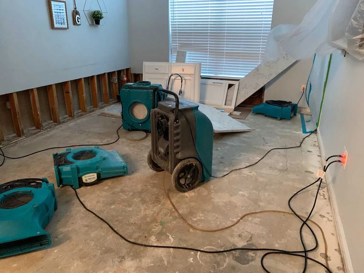 Dehumidifier in flood-cut room for Water Damage Restoration in Falmouth
